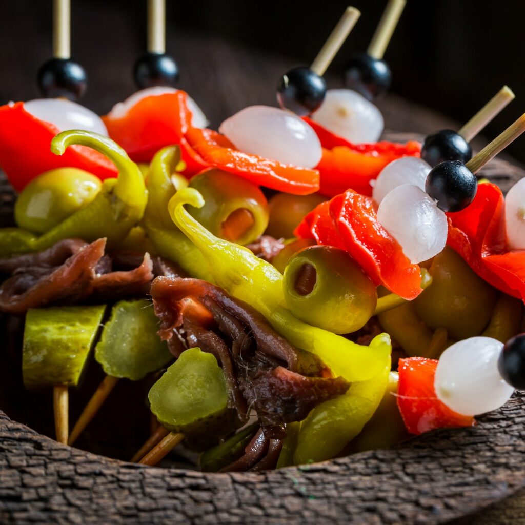 Delicious banderillas with peppers, olives and anchovies for spanish corrida